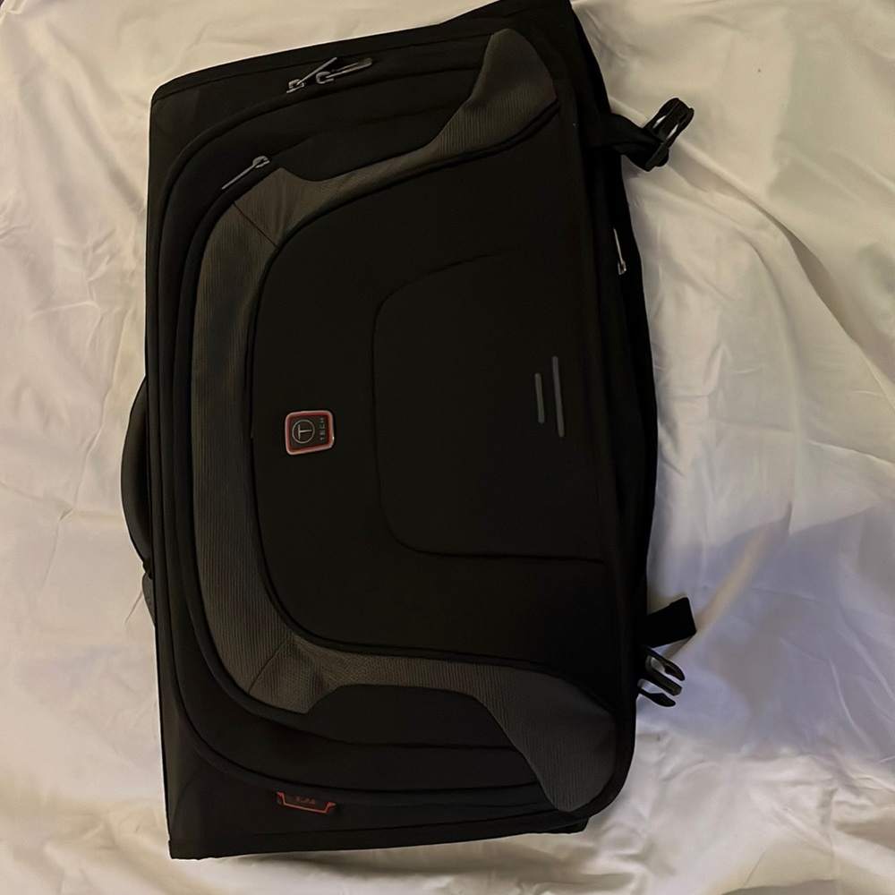 Tumi Tech Tri-fold bag with strap